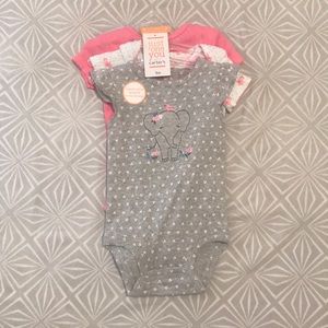 Baby girl three piece onesie set